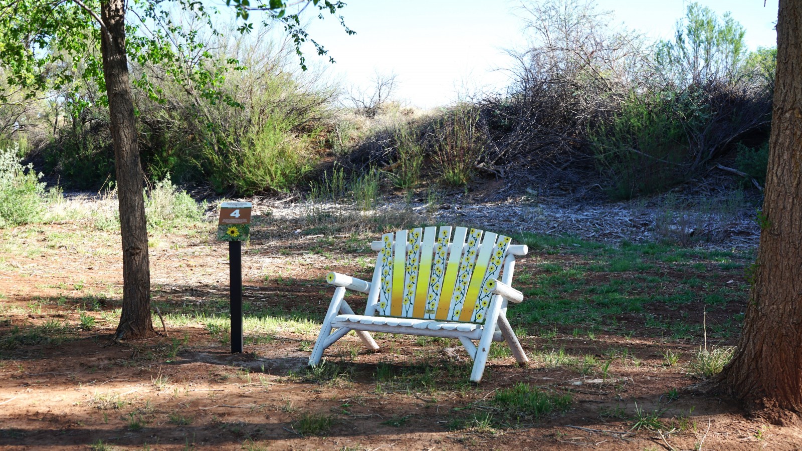 Bosque Redondo Memorial Natural Trail Audio Tour Stop 4 beside painted bench.