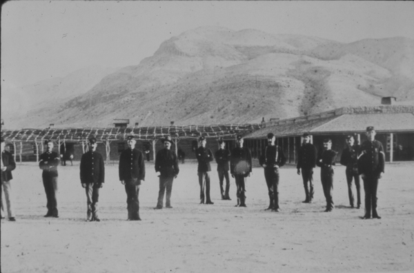 Historic photograph of Fort Selden when the post was active. Image taken on Parade Ground with Enlisted Soldier Barracks, Post Hospital, and Robledo Mountains in the background. Negative # 014523.