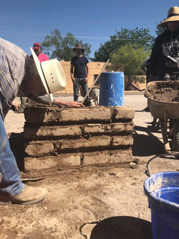Pat Taylor teaches adobe work at the Taylor-Mesilla Historic Property during a preservation workshop held in 2019 in partnership with the New Mexico Humanities Council.