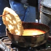 Cooking fried bread at Pueblo Independence Day.