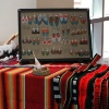 Pueblo textile artist Louie Garcia demonstrated traditional weaving techniques using yucca and cotton.